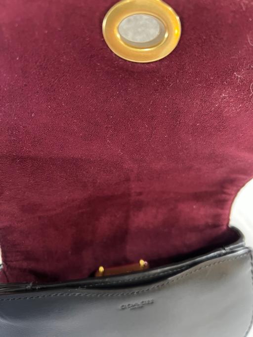  — Coach handbag