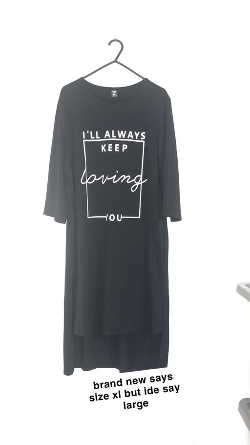  — Size large women’s dress brand new
