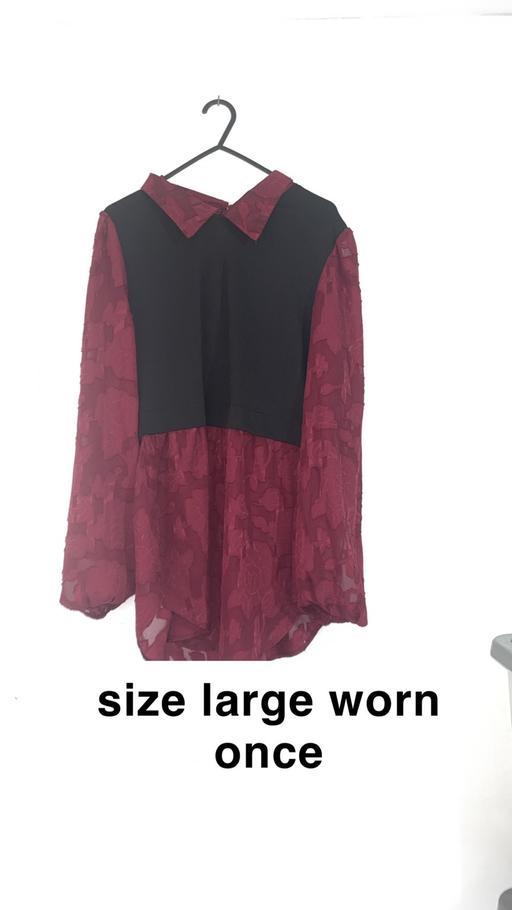  — Women’s collared top great condition
