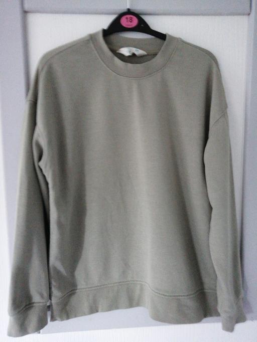  — ladies size *XS* Small mark on back of sleeve