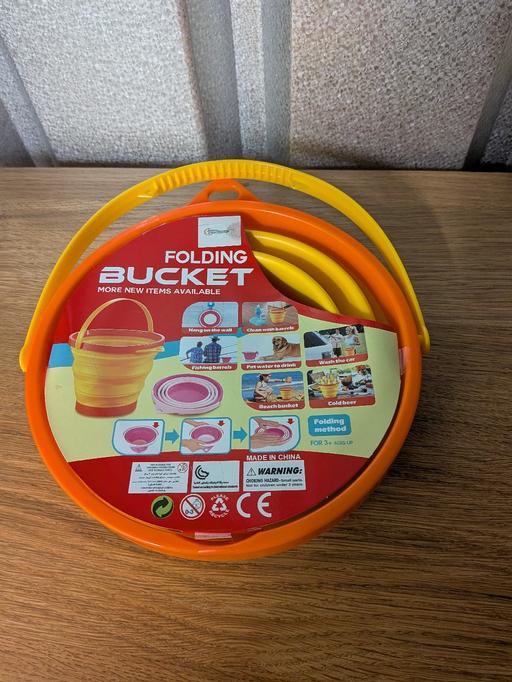  — New folding bucket