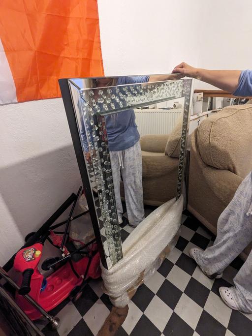  — large heavy mirror
