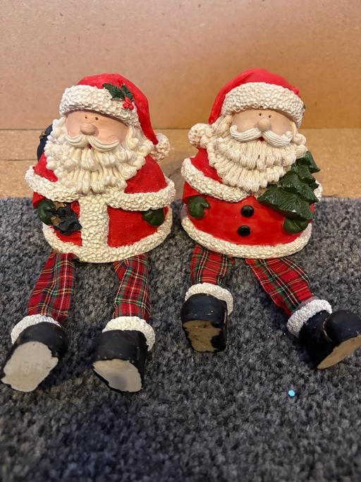  — Pair of Sitting Santa Christmas Decorations