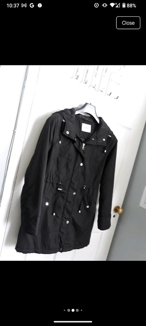  — women shower proof jacket size XS