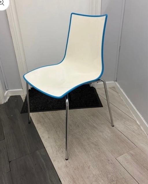  — Dining chair with chrome legs