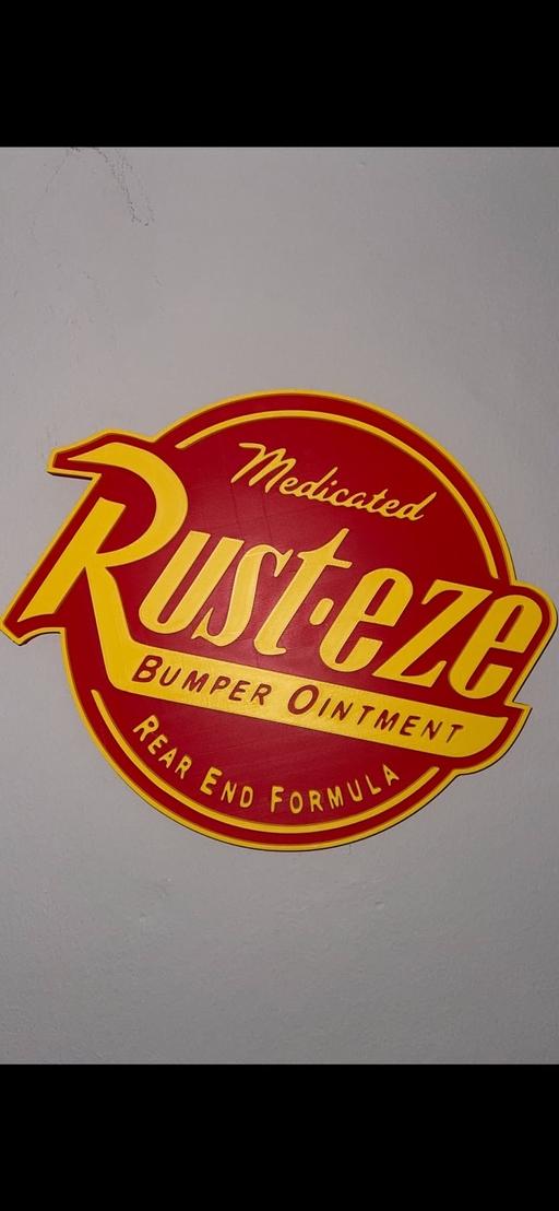  — RUST-EZE WALL SIGN