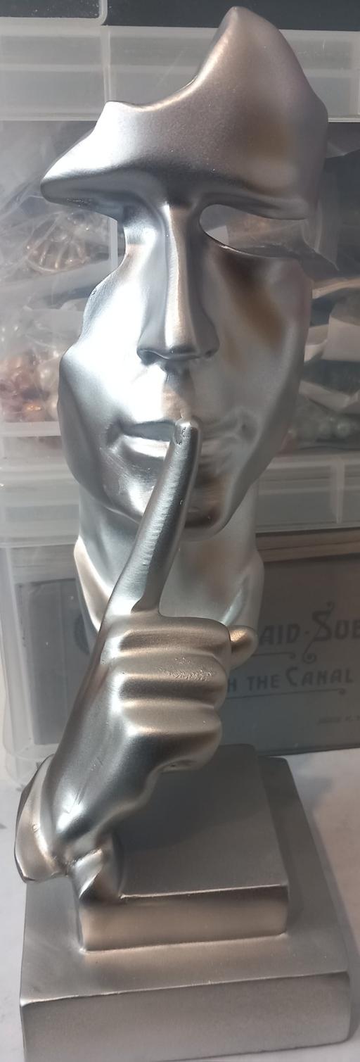  — Modern Silver "Silence is Golden" statue