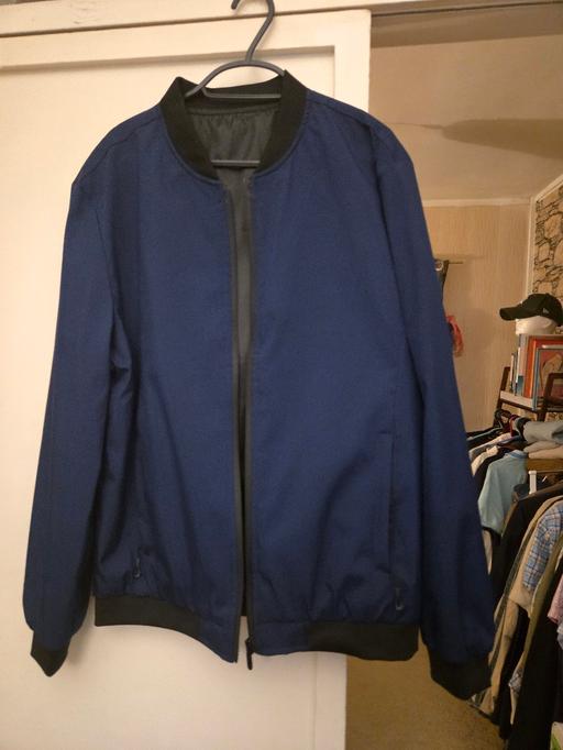  — blue jacket