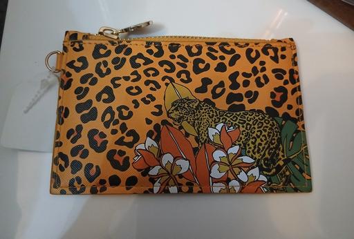  — Purse New