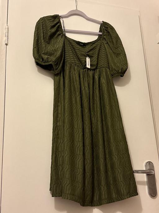  — Green dress
