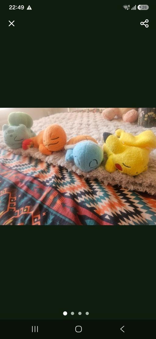  — Pokemon teddies and figurines