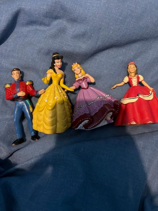  — Disney figures
