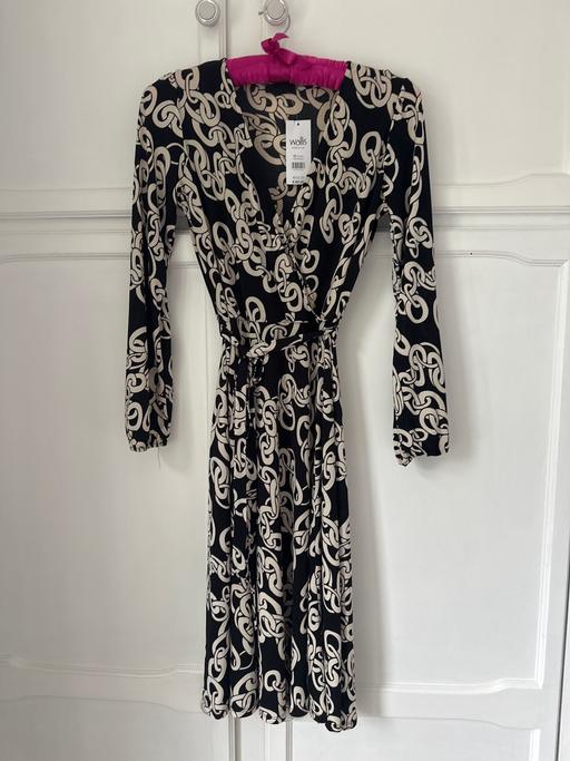  — Dress
