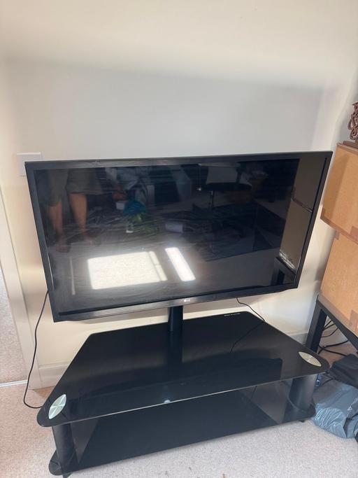  — Black glass tv stand (TV no included)