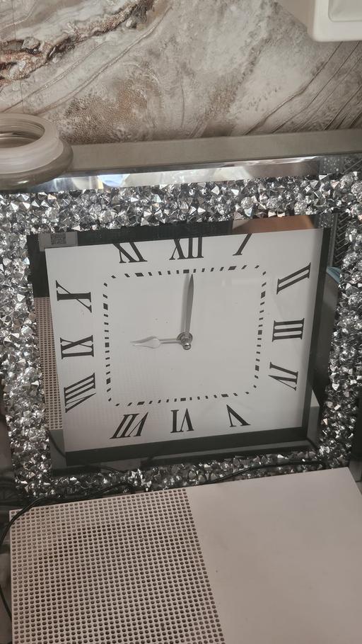  — clock