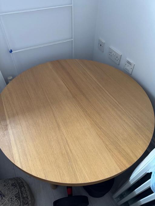  — IKEA round coffee table.