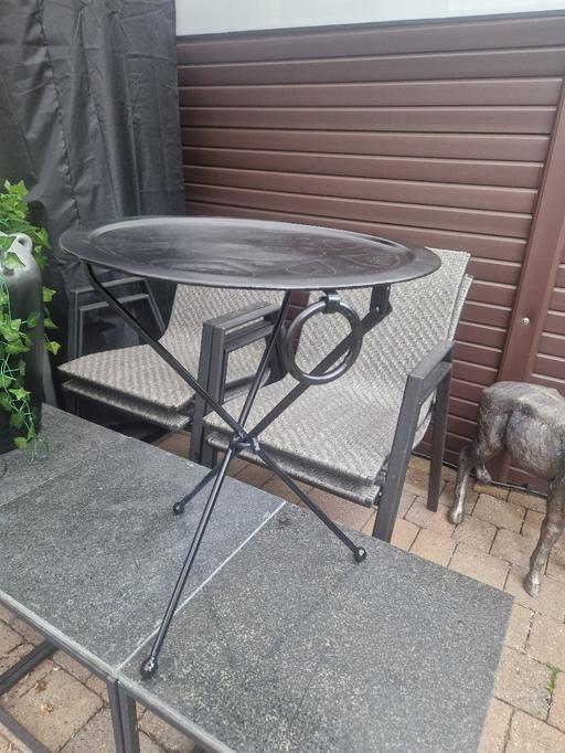  — Black metal fold up table