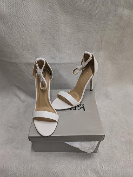  — New size 4 white heels