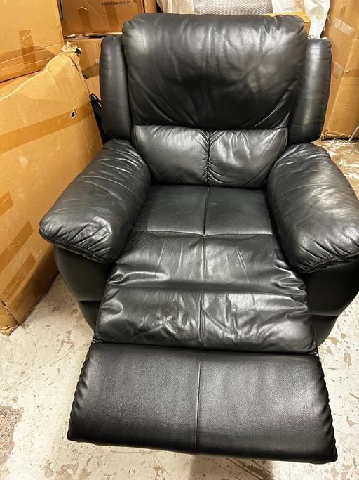  — Black leather manual reclining armchair