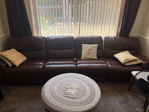  — 4 seater brown sofa with 2 electric recliners