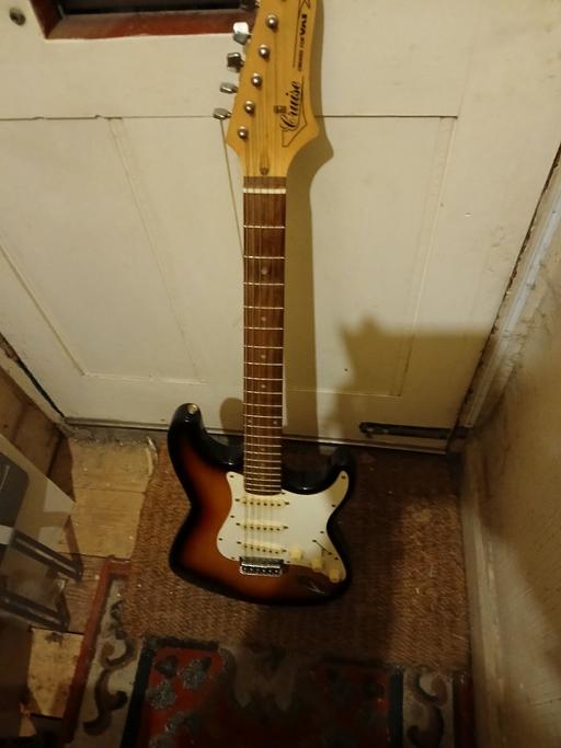  — ELECTRIC GUITAR