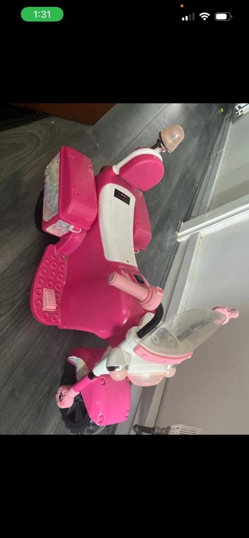  — Electric ride on scooter