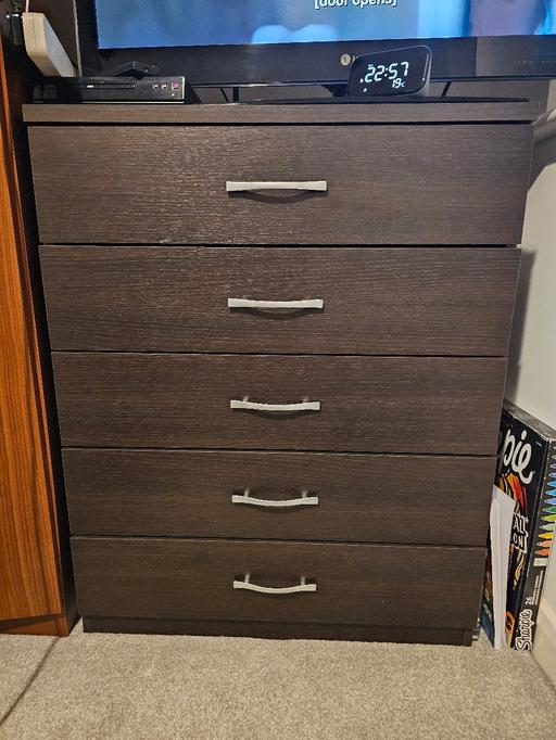  — Dark brown chest of 5 drawers