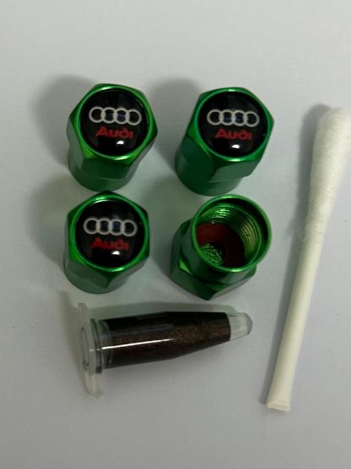  — Audi Tyre valve caps with grease