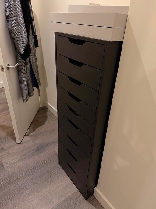 — Chest of drawers. Black. 9 drawers. Dresser