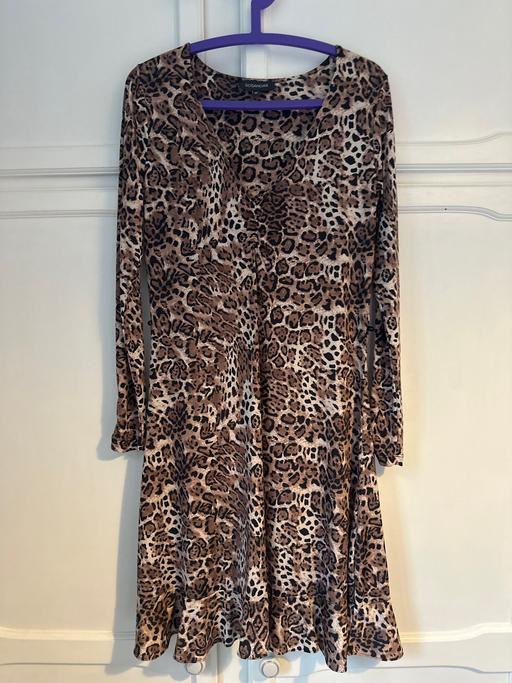  — Dress
