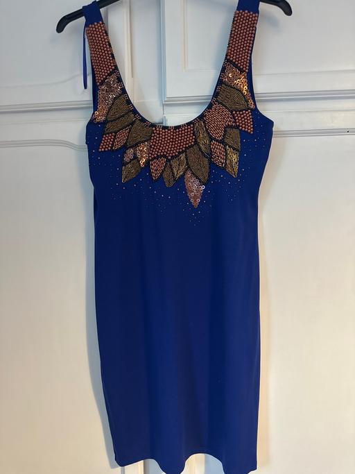  — Dress
