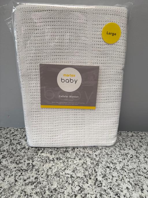  — Baby’s cellular cot blanket