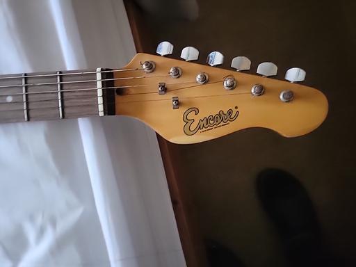  — guitars electric and non