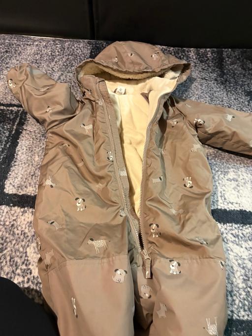  — Puddle suit