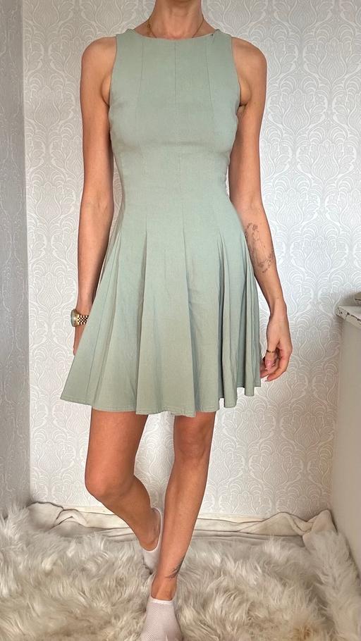  — Prettylittlething green skater dress size 6