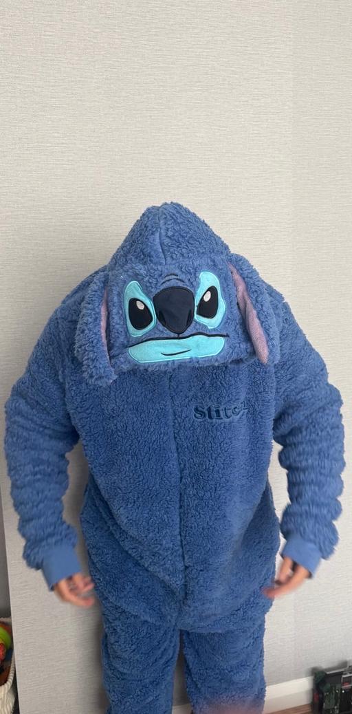  — Stitch onesies size Large