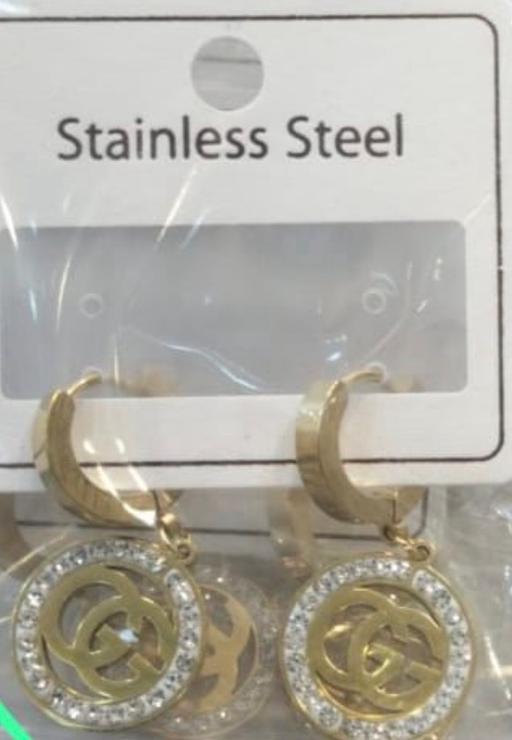  — Earrings