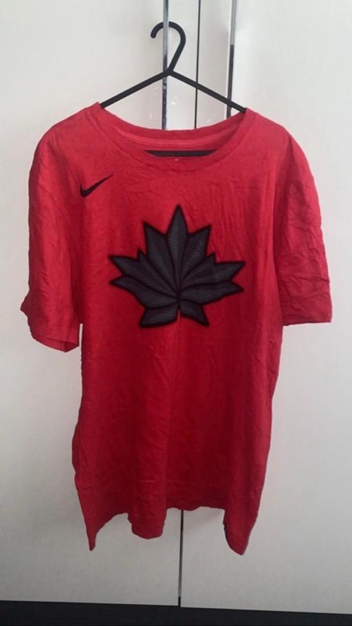  — Red Nike men’s t shirt