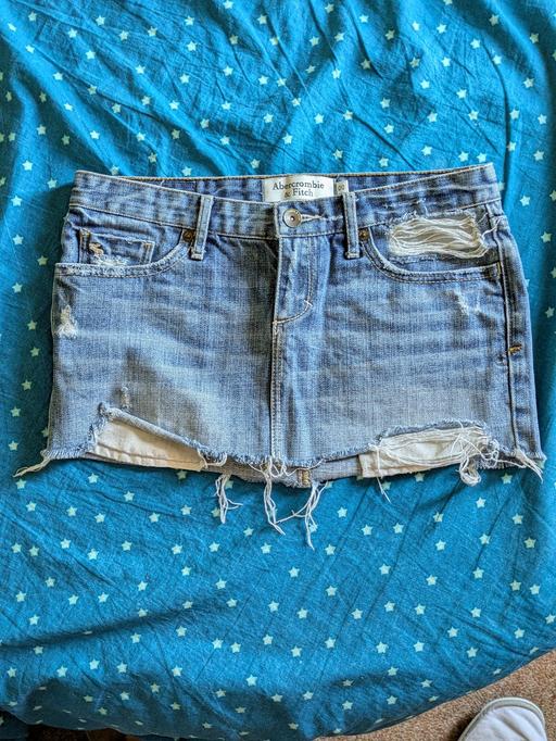  — vintage low-rise distressed denim mini skirt
