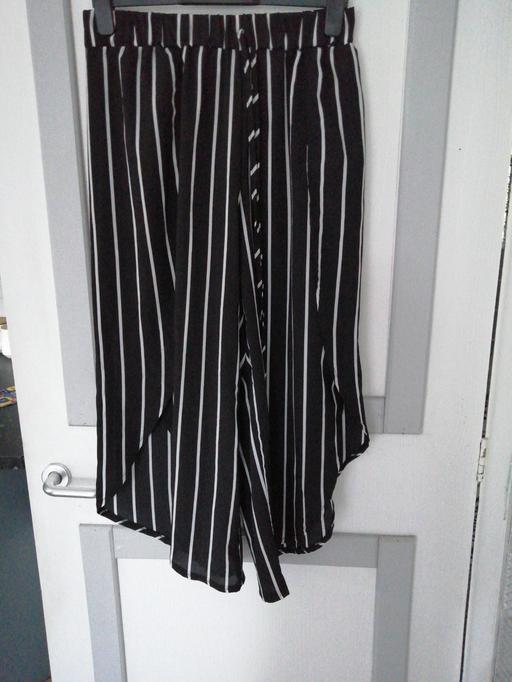  — ladies trousers open Down sides