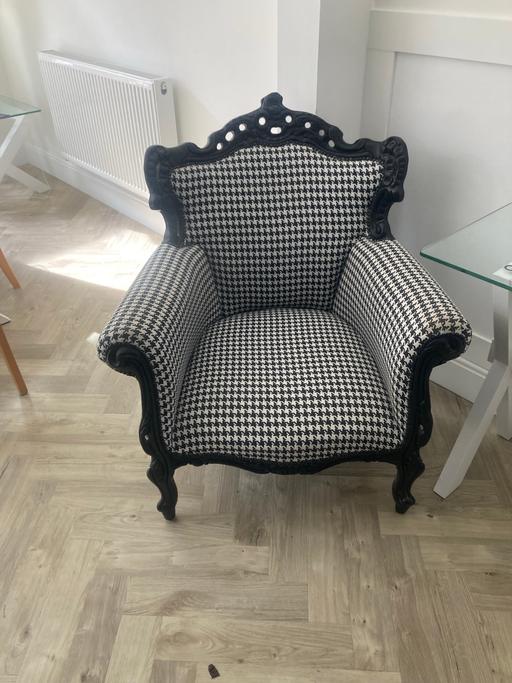  — Black and white easy chair