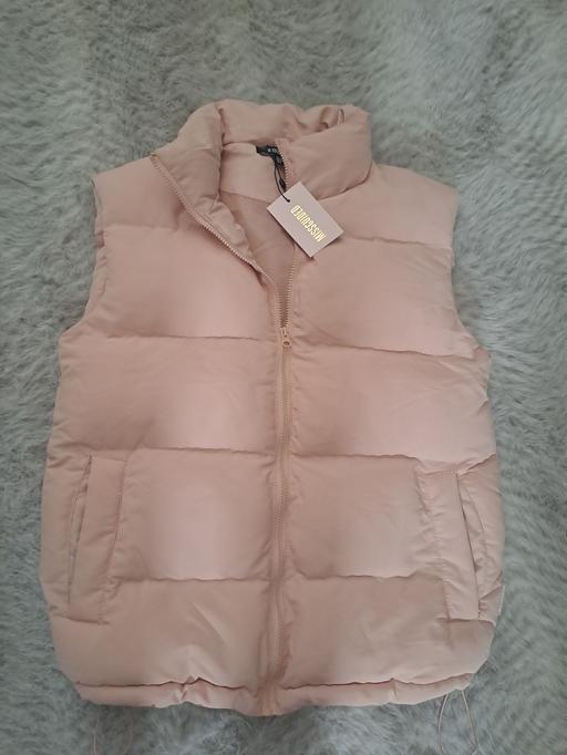  — body warmer new with tags