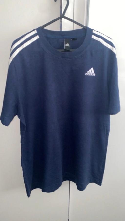  — Men’s blue adidas t shirt