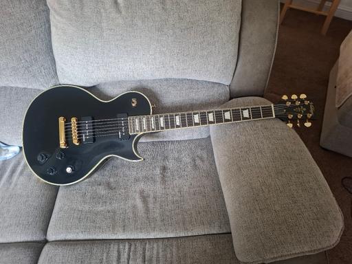  — electric vintage black guitar