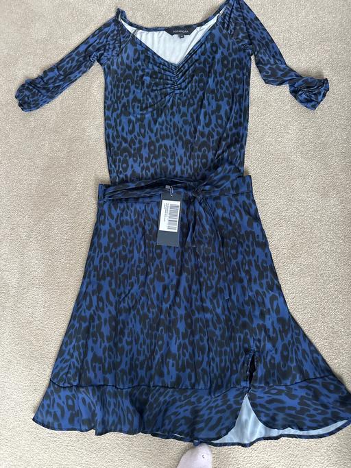  — Skirt with matching top