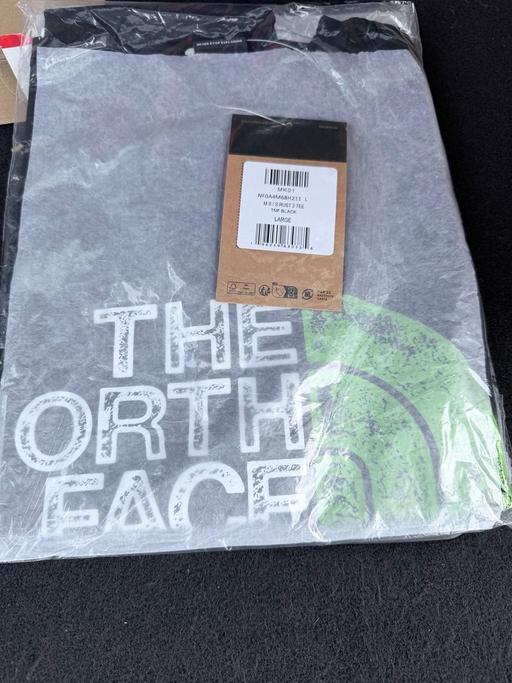  — men’s black and green The north face t shirt