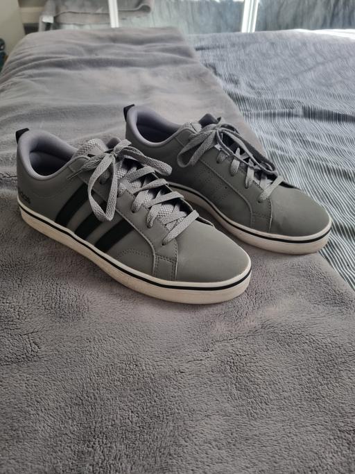  — Grey addidas trainers
