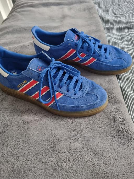  — blue addidas trainers