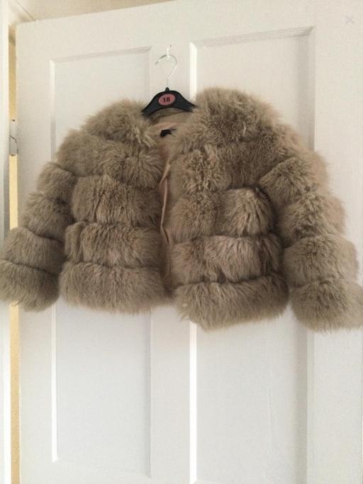  — Faux fur jacket age 7/8