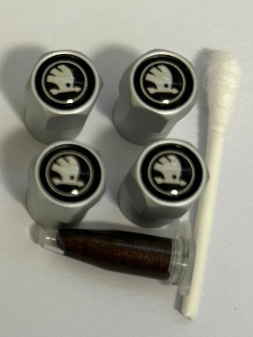  — Skoda tyre valve caps with grease